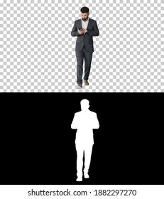 Businessman Walking And Using The Phone, Alpha Channel With Silh