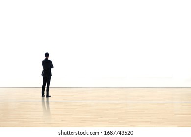 Businessman Watching  Blank Space Wall In Modern Gallery, Art Exhibition Minimal Concept, 