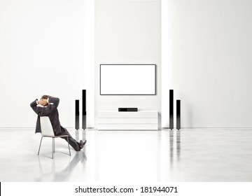 Businessman watching TV