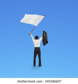 A Businessman Waving Blank White Flag Isolated On Blue Background