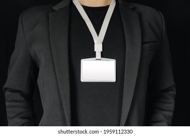 Businessman wearing ID card around neck mockup. 