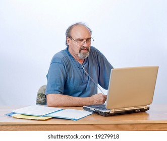 A Businessman Wears A Cannula From A Portable Oxygen Tank