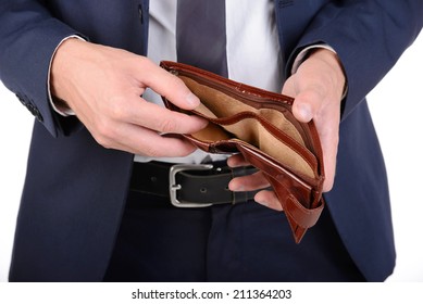 Businessman well-dressed with empty wallet, no money