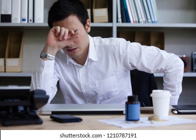 The businessman who seems to be bad of the physical condition - Shutterstock ID 1210787191