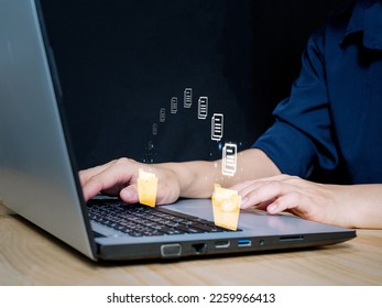 Businessman who is transferring data files data migration Backing up documents within the organization through a digital virtual window - Shutterstock ID 2259966413