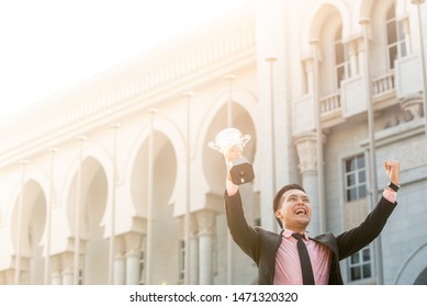 Businessman Wins A Trophy. Top Salesperson Concept