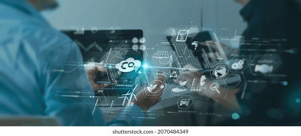 Businessman Wit Team Working Virtual Modern Smart Phone To Reduce CO2 Emissions Carbon Footprint Climate Change To Limit Global Warming.Sustainable Development And Green Business Concept.