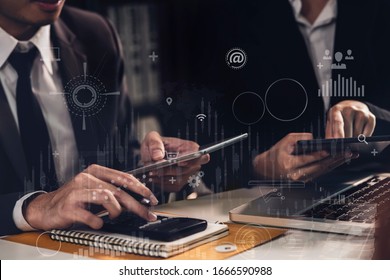 Businessman and woman discussing with the business team working documents at the office. Digital tablet and graph financial with social network diagram. - Shutterstock ID 1666590988