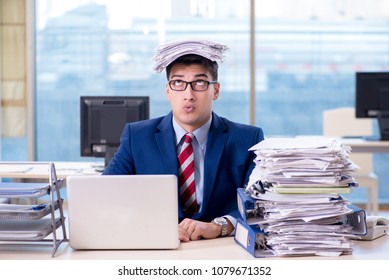 Businessman Workaholic Struggling With Pile Of Paperwork