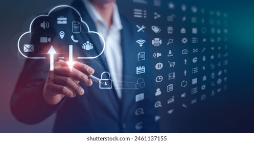 Businessman working with cloud technology with cybersecurity data protection system. People choose cloud computing services to upload and store document files of various sizes.