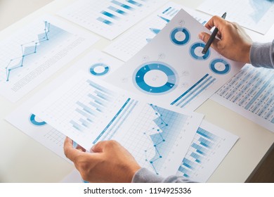 businessman working data document graph chart report marketing research development  planning management strategy analysis financial accounting. Business  office concept. - Shutterstock ID 1194925336