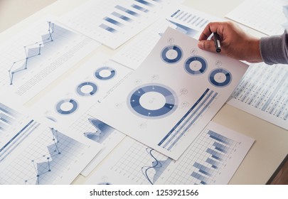 businessman working data document graph chart report marketing research development  planning management strategy analysis financial accounting. Business  office concept.
