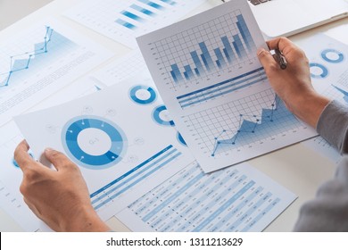 businessman working data document graph chart report marketing research development  planning management strategy analysis financial accounting. Business  office concept.