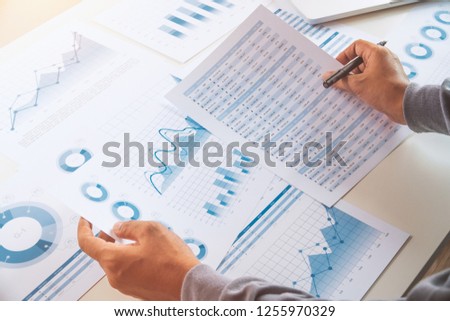 businessman working data document graph chart report marketing research development  planning management strategy analysis financial accounting. Business  office concept.