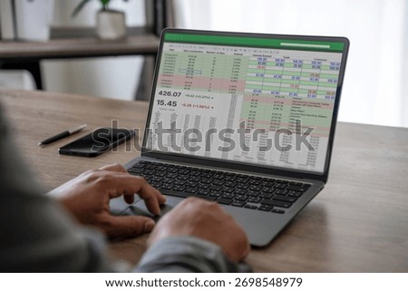 businessman working with data and graphs in spreadsheet documents for online analysis Microsoft Excel project dashboard accounting digital