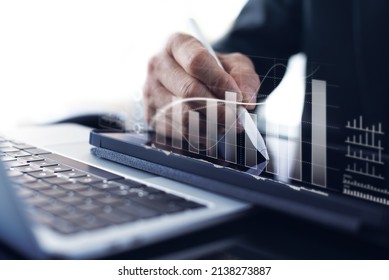 Businessman working with digital tablet computer virtual dashboard analyzing finance sales data and economic growth graph chart and account report, business finance and investment concept.
