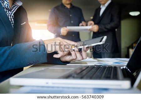 businessman working with digital tablet computer and smart phone and laptop.