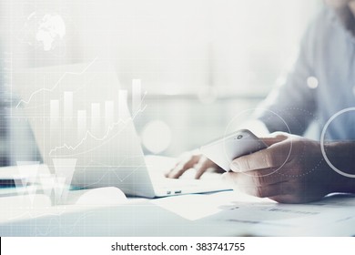 Businessman Working With Generic Design Notebook. Holding Smartphone In Hands. Worldwide Connection Technology Interface 