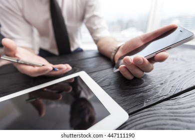 Businessman working at his desk. - Shutterstock ID 447111190