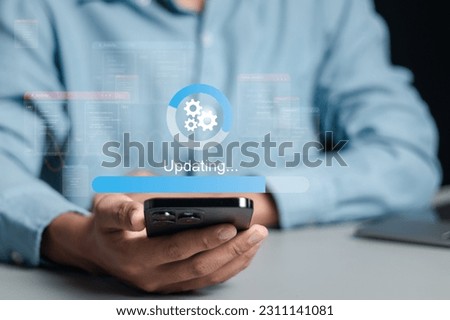 Businessman working and installing update process. Software updates or operating system upgrades to keep your device up to date with enhanced functionality in new versions and improved security.