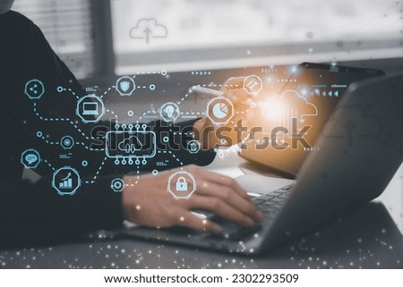 Businessman working laptop computer futuristic diagram network cloud computing stronge data system. interface cloud icon connect data base station operations use artificial intelligence or AI system 