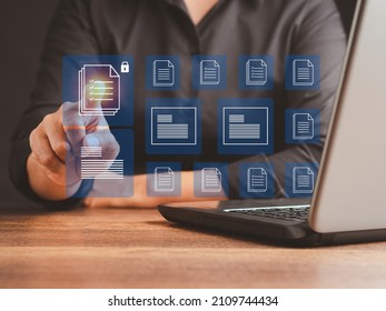 Businessman Working At A Laptop And Digital Documents With Checkbox Lists On Virtual Screen. Online Documentation Database And Digital File Storage Concept.