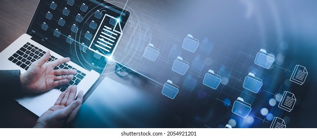 Businessman working modern compter Document Management System (DMS),Virtual online documentation database and process automation to efficiently manage files,documentation in enterprise with ERP. - Shutterstock ID 2054921201