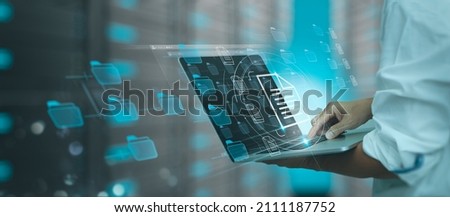 Businessman working modern compter Document Management System (DMS),Virtual online documentation database and process automation to efficiently manage files, knowledge and documentation enterprise