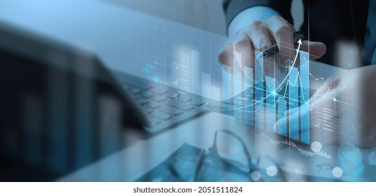 Businessman Working With Modern Computer Calculator Virtual Dashboard Analyzing Finance Sales Data And Economic Growth Graph Chart And  Account Report Technology.