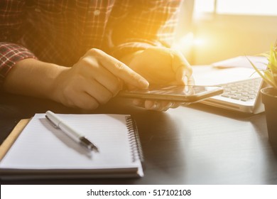 businessman working with modern devices, digital tablet computer and smartphone,Hipster texting message on mobile,selective focus,vintage color