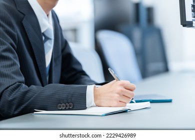 businessman working in the office - Shutterstock ID 2229426989