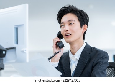 businessman working in the office - Powered by Shutterstock