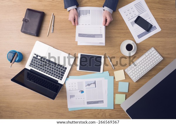 Businessman Working Office Desk Checking Financial Stock Photo