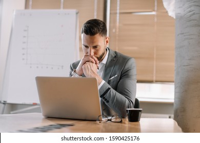 Businessman working in the office. Man in business suite in conference room.  Manager preparing for presentation business presentation. - Shutterstock ID 1590425176