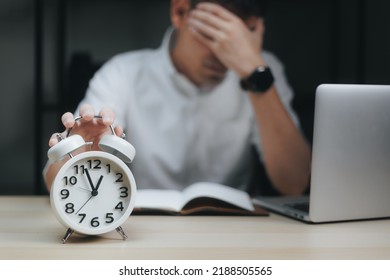 Businessman working at the office overtime until late and tired from work. - Shutterstock ID 2188505565