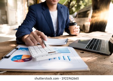 Businessman Working On Desk Office With Using A Calculator To Calculate The Numbers, Finance Accounting Concept