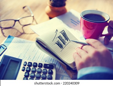 Businessman Working on Project About Business Growth - Shutterstock ID 220240309