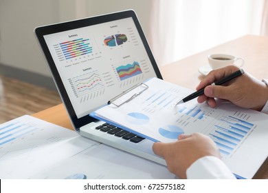 businessman working plan the business and analysis many chart graph 
 - Powered by Shutterstock