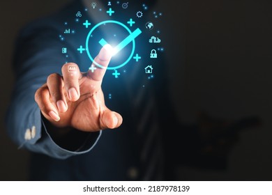 Businessman working with protection systems for quality assurance symbols, standards, ISO certification and technology standards concepts.	 - Shutterstock ID 2187978139