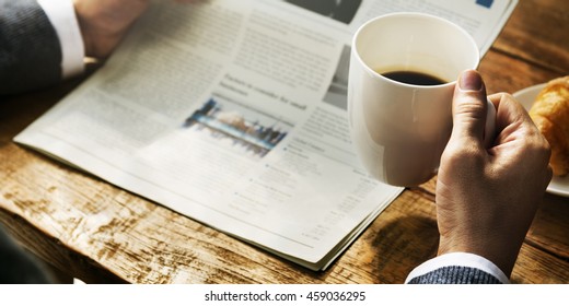 Businessman Working Reading Newspaper Information Concept - Powered by Shutterstock