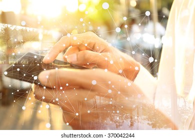 Businessman working with smartphone. Concept of modern technology, network connection. Image closed up hand make multiple layers and blur lens flare with blank space. - Shutterstock ID 370042244