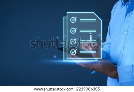 Businessman working with tablet. Checking mark up on the check boxes. Successful completion of business tasks. Digital marketing of statistics level up of graph. Business management goal strategy.