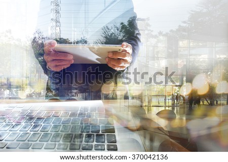 Businessman working with tablet. Concept of modern technology, network connection. Image closed up hand make multiple layers and blur lens flare with blank space.