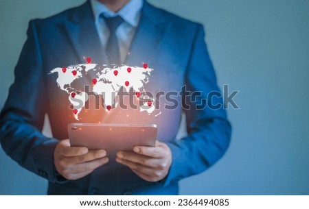 Businessman working with tablet remotely on location map pin with access to modern technology network Concept of global data access speed and enterprise expansion