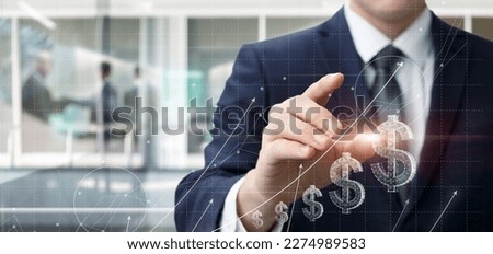 Businessman works with graph of financial growth and successful trading.