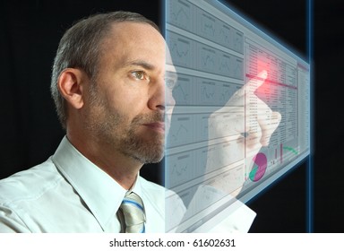 Businessman works with huge LCD panel - Powered by Shutterstock - Get 15% off with code: PIKWIZARD15
