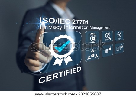 Businessman works on ISO 27701 privacy information management an online user privacy standard this is subset of ISO 27001 for informantion technology securuty.