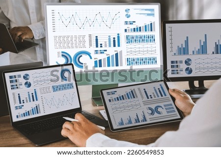 businessman works  Statistics Data Dashboard Information Business Technology and Strategy Research