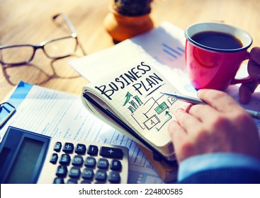 Businessman Writing Business Plan Growth Concept