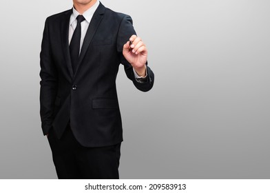 Businessman writing, drawing on blank space - Powered by Shutterstock